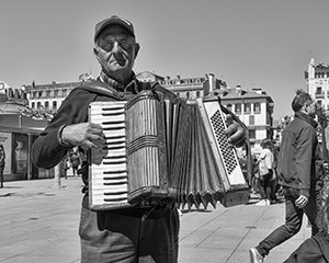 Accordian Man by Clyde Comstock